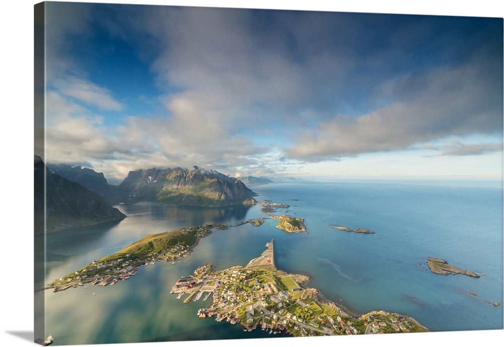 Blue sky and clouds frame the turquoise sea and the typical village, Reinebringen, Moskenesoya, Lofoten Islands, Norway, S...