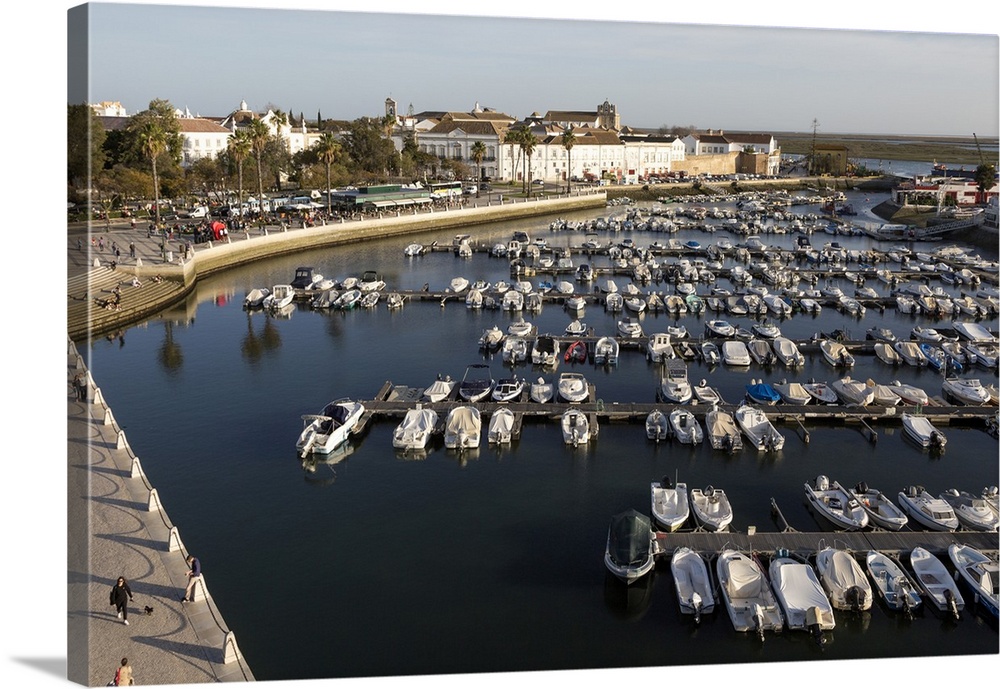 Boats at moorings in the evening inn the marina in the harbour at Faro, Algarve, Portugal, Europe