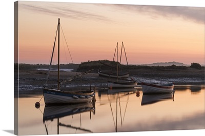 Boats in the channel on a beautiful morning at Burnham Overy Staithe, Norfolk, England