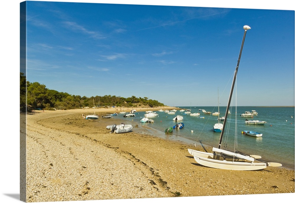 Boats moored in the entrance to Fier d Ars by the beach at La Patache, Les Portes-en-Re, Ile de Re, Charente-Maritime, France