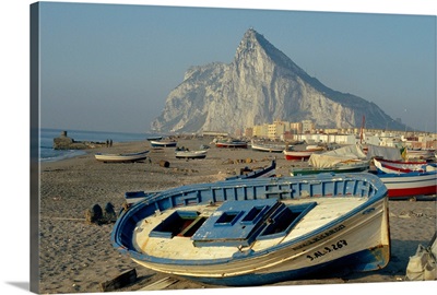 Boats pulled onto beach below the Rock of Gibraltar, Gibraltar