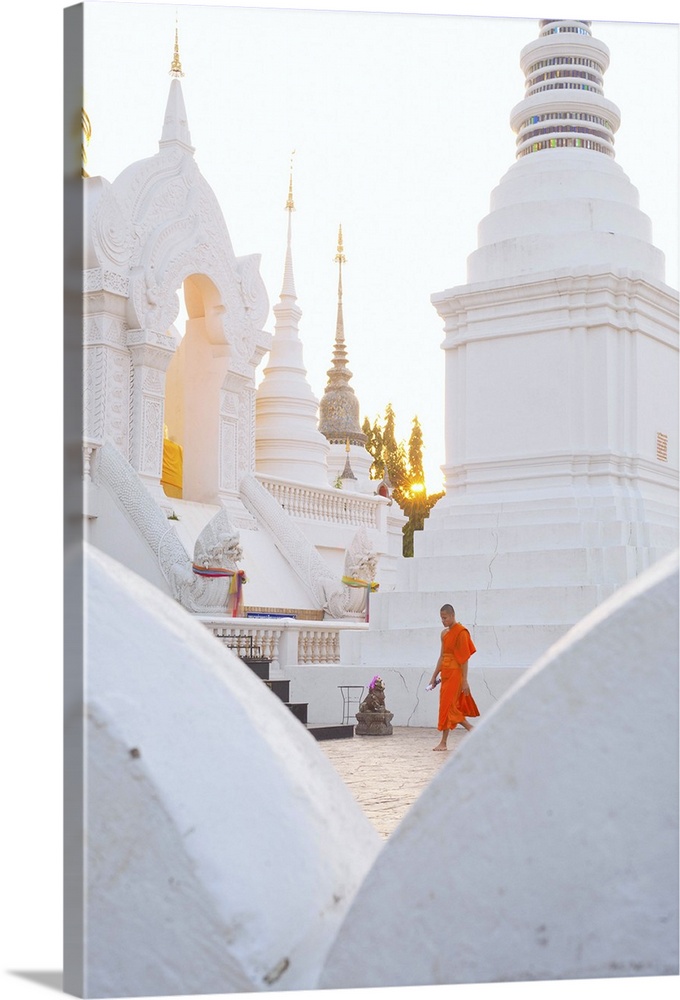 Buddhist monk walking around Wat Suan Dok Temple in Chiang Mai, Thailand, Asia