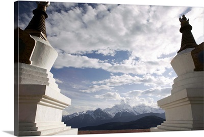 Buddhist stupas on way to Deqin, Meili Snow Mountain peak in the background, China