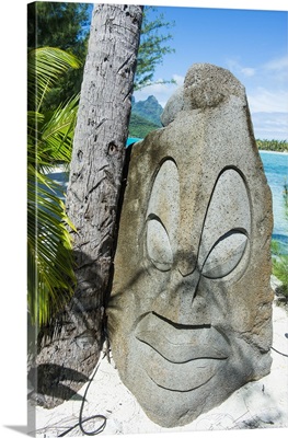 Carved stone statue on a Motu, Bora Bora, Society Islands, French Polynesia