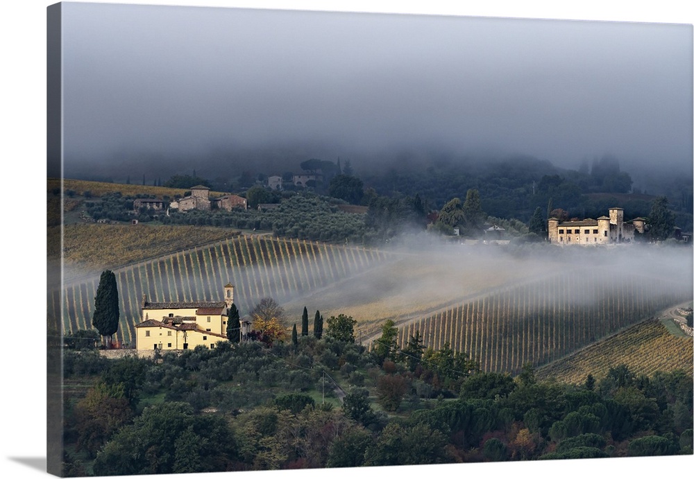 Castello di Gabbiano across a misty valley, church in foreground, San Casciano, Tuscany, Italy, Europe