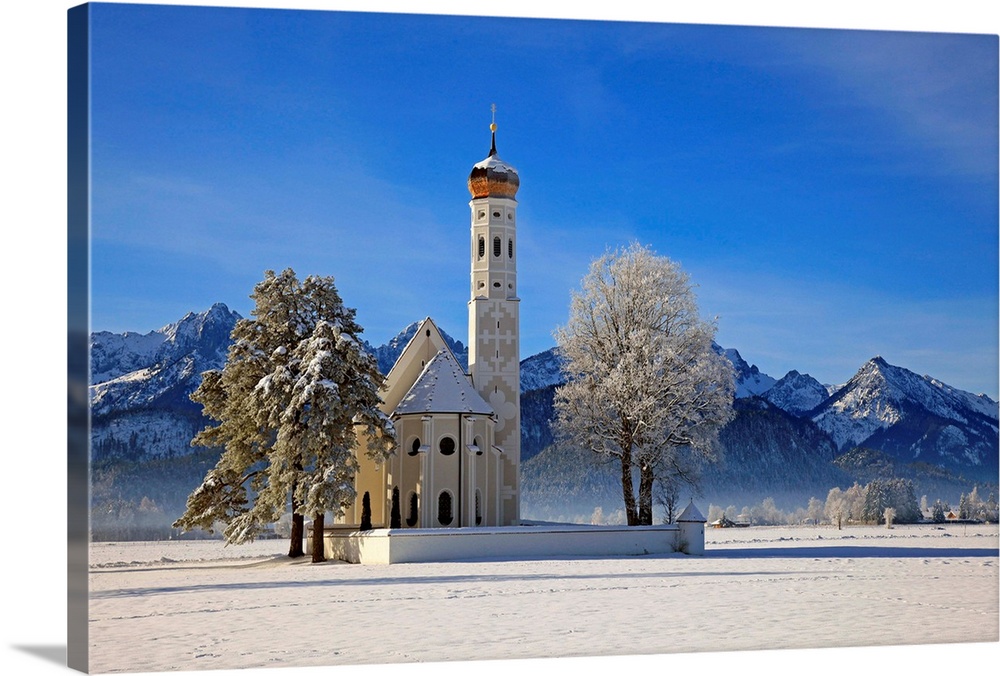 Church of St. Coloman and Tannheimer Alps near Schwangau, Allgau, Bavaria, Germany