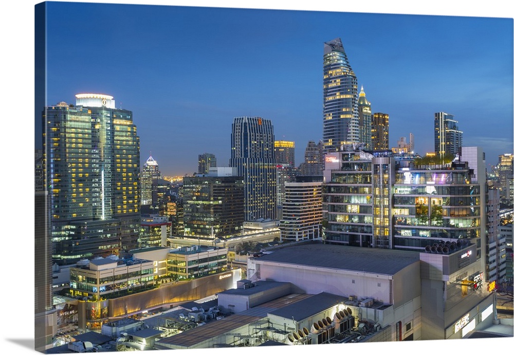 City skyline at dusk from hotel rooftop bar, Bangkok, Thailand, Southeast Asia