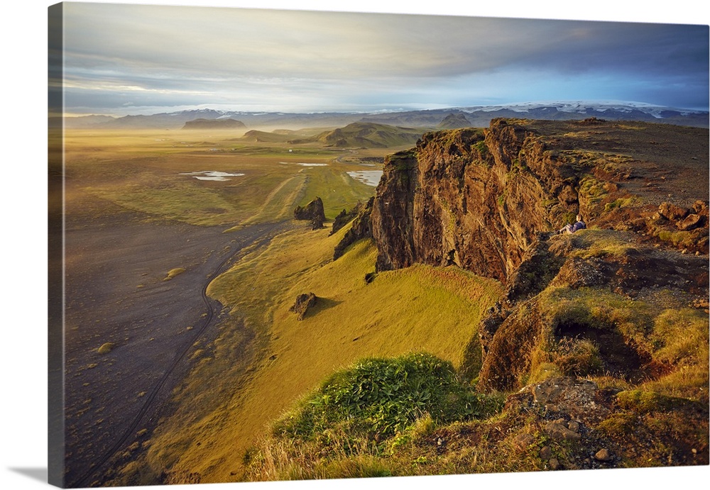Cliff and mountain view from Dyrholaey Island, just before sunset, near Vik, south coast of Iceland, Polar Regions