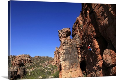 Climber on cliffs in the Cederberg mountains, Western Cape
