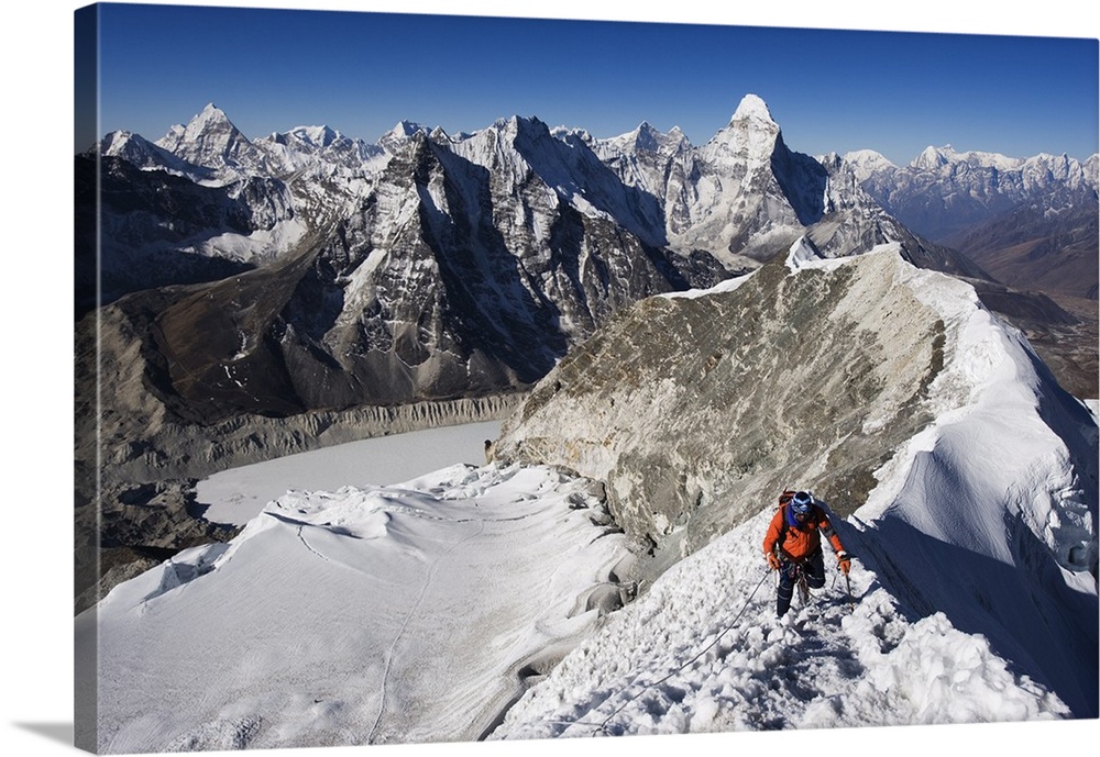 Climber on summit ridge of Island Peak, Ama Dablam, Himalayas, Nepal