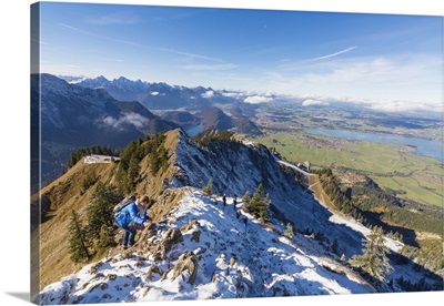 Climbers on steep crest covered with snow in the Ammergau Alps,  Bavaria, Germany