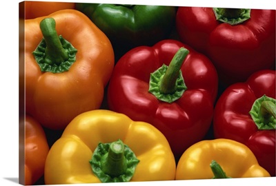 Close-up of yellow, red, orange and green peppers