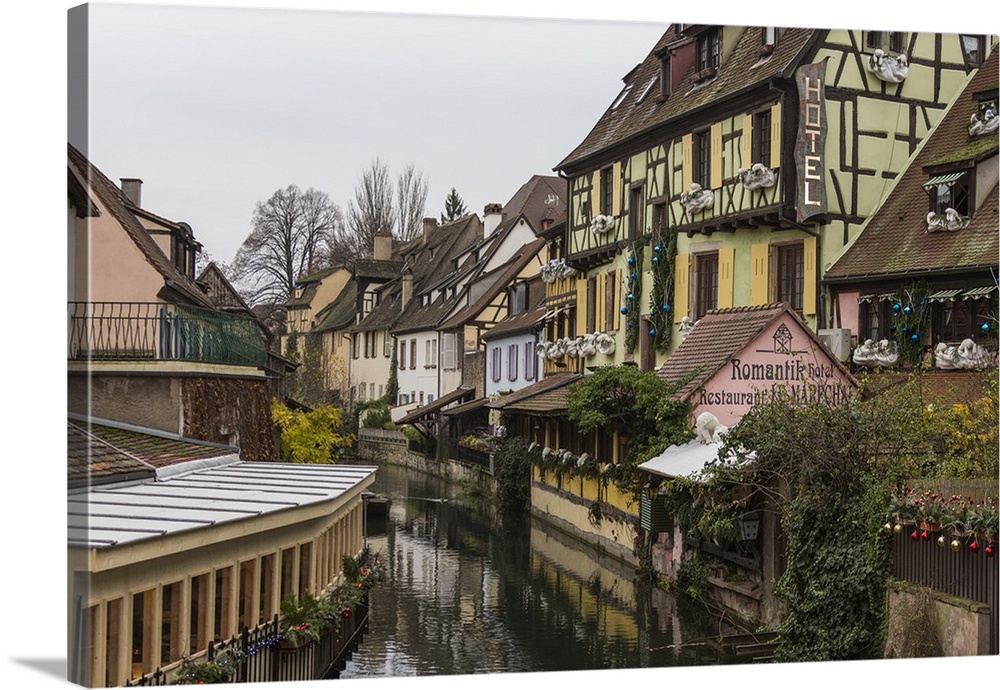 Colored houses reflected in river Lauch at Christmas time, Petite Venise, Colmar, Haut-Rhin department, Alsace, France, Eu...