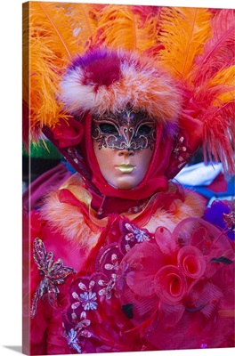 Colorful mask and costume of the Carnival of Venice, famous festival worldwide