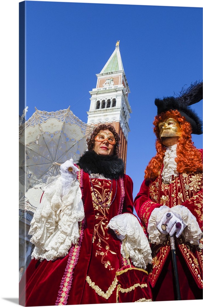 Colourful masks and costumes of the Carnival of Venice, famous festival worldwide, Venice, Veneto, Italy