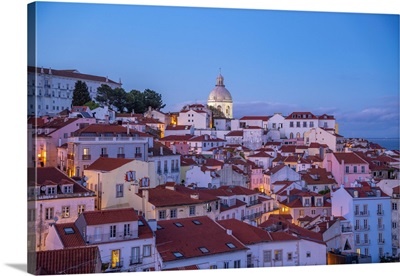 Colourful Buildings And Red Rooftops At Dusk In The Alfama District, Lisbon, Portugal