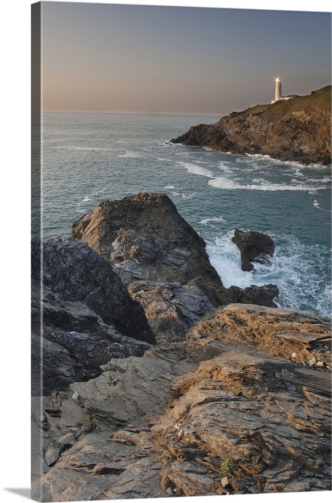 A peaceful dusk on Cornwall's Atlantic coast, showing the lighthouse at Trevose Head, near Padstow, Cornwall, England, Uni...