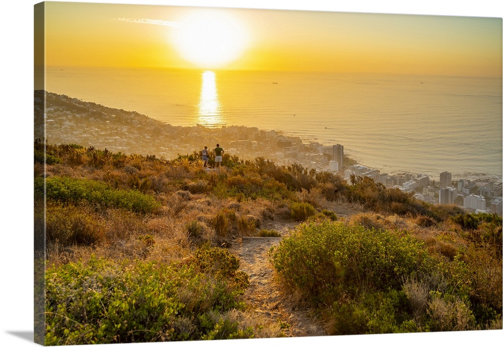 Couple watching sunset over Bantry Bay from Signal Hill, Cape Town, Western Cape, South Africa, Africa