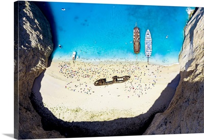 Crowd Of Tourists Sunbathing On The Idyllic Shipwreck Beach, Greece