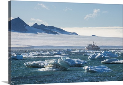 Cruise ship behind icebergs, Brown Bluff, Tabarin Peninsula, Antarctica