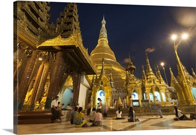 Devotees come to pray at Shwedagon Pagoda, Yangon, Myanmar