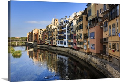 Distinctive historic colourful arcaded houses and Onyar River, Catalonia, Spain