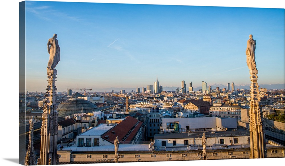 Downtown Milan as seen through the roof of the city's famous Duomo cathedral, Milan, Lombardy, Italy