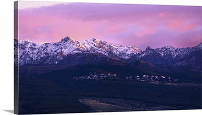Dramatic Purple Sunset Above Snowy Rugged Summits Of Los Cumbres Verdes, Spain