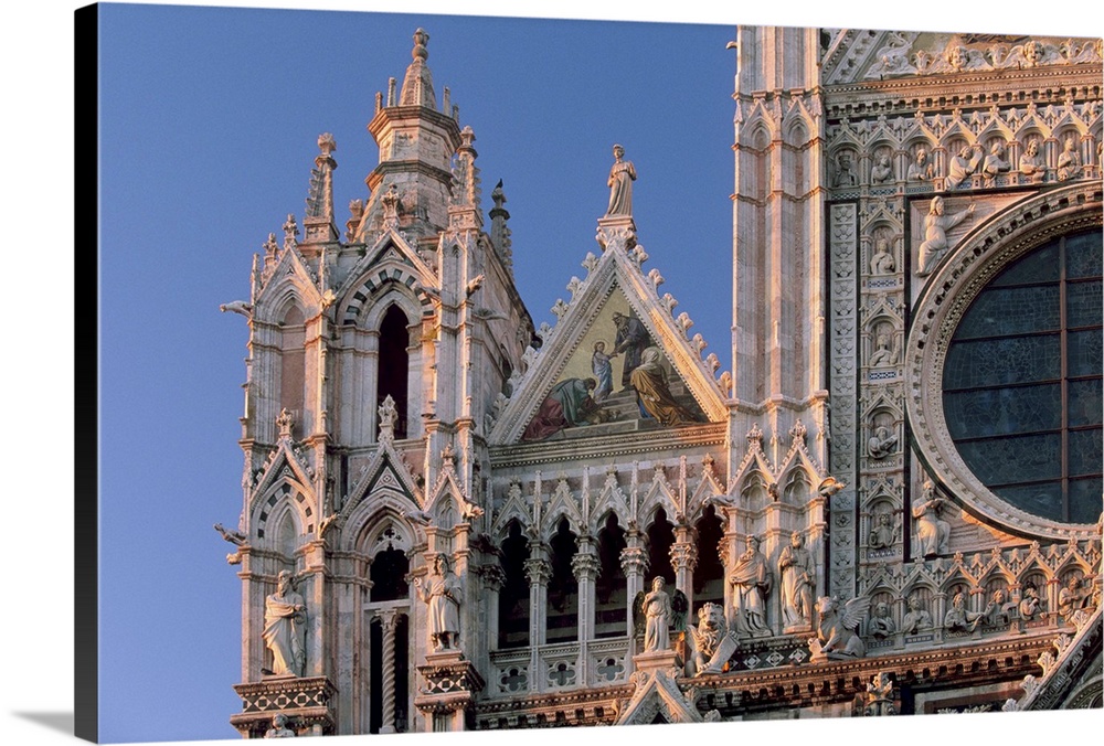 Facade and pinnacles of the Duomo, Siena, Tuscany, Italy