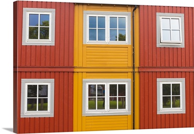 Facades and windows of typical wooden houses of fishermen in Svolvaer, Norway