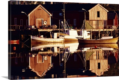 Fishing boats and wooden barns on the waterfront at Bausrad, Norway, Scandinavia