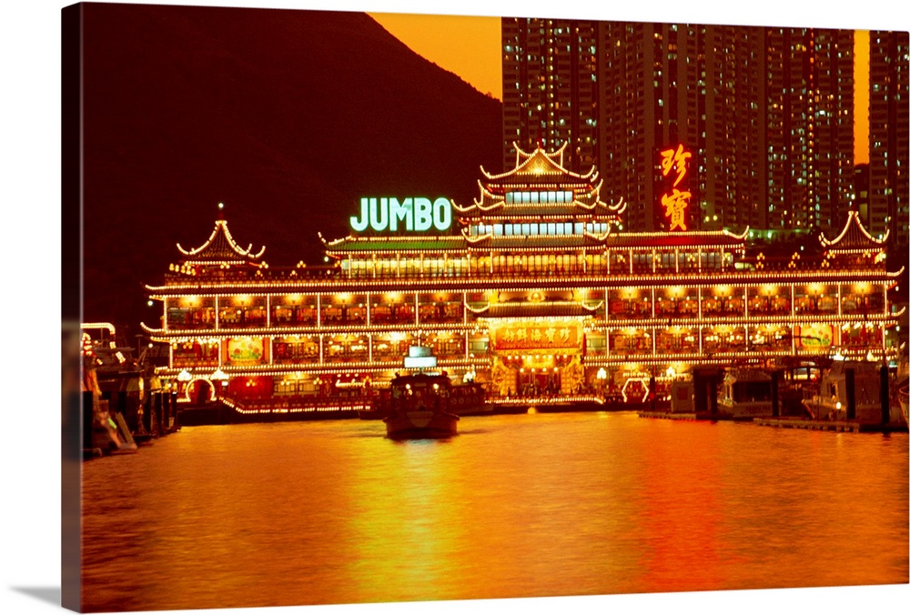 Floating restaurant illuminated at night, Aberdeen Harbour, Hong Kong, China