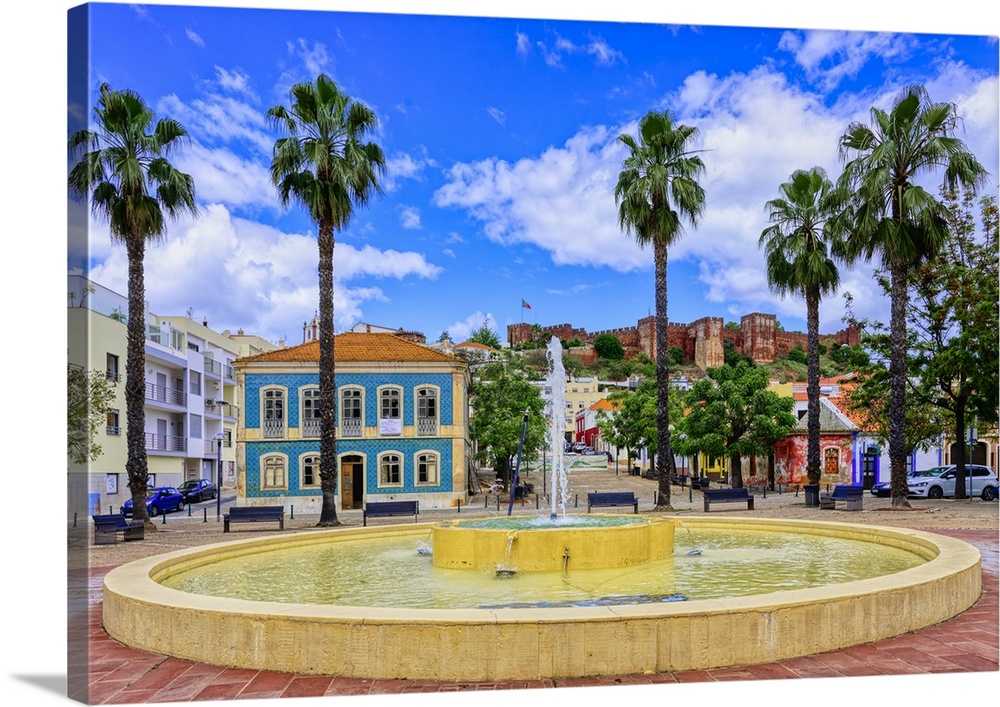 Fountain with a view of the Silves fortress, Algarve, Portugal, Europe