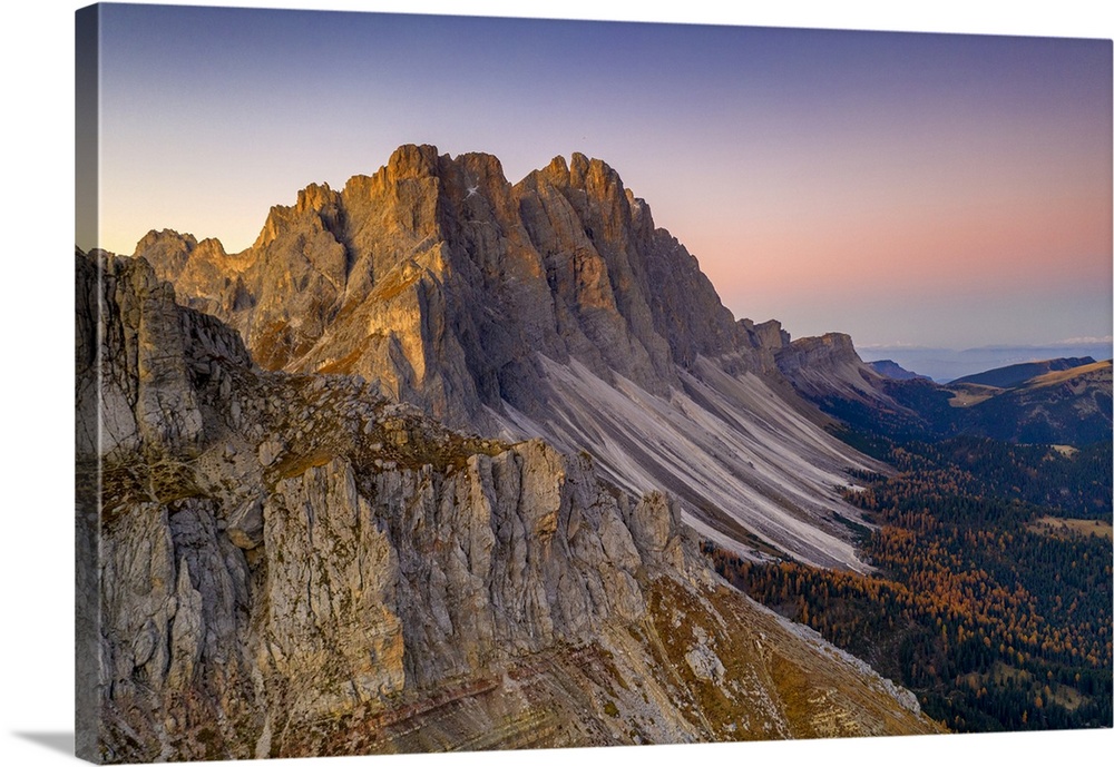 Autumn trees at feet of Furchetta and Sass Rigais, aerial view, Puez-Odle, Funes Valley, Dolomites, Bolzano, South Tyrol, ...