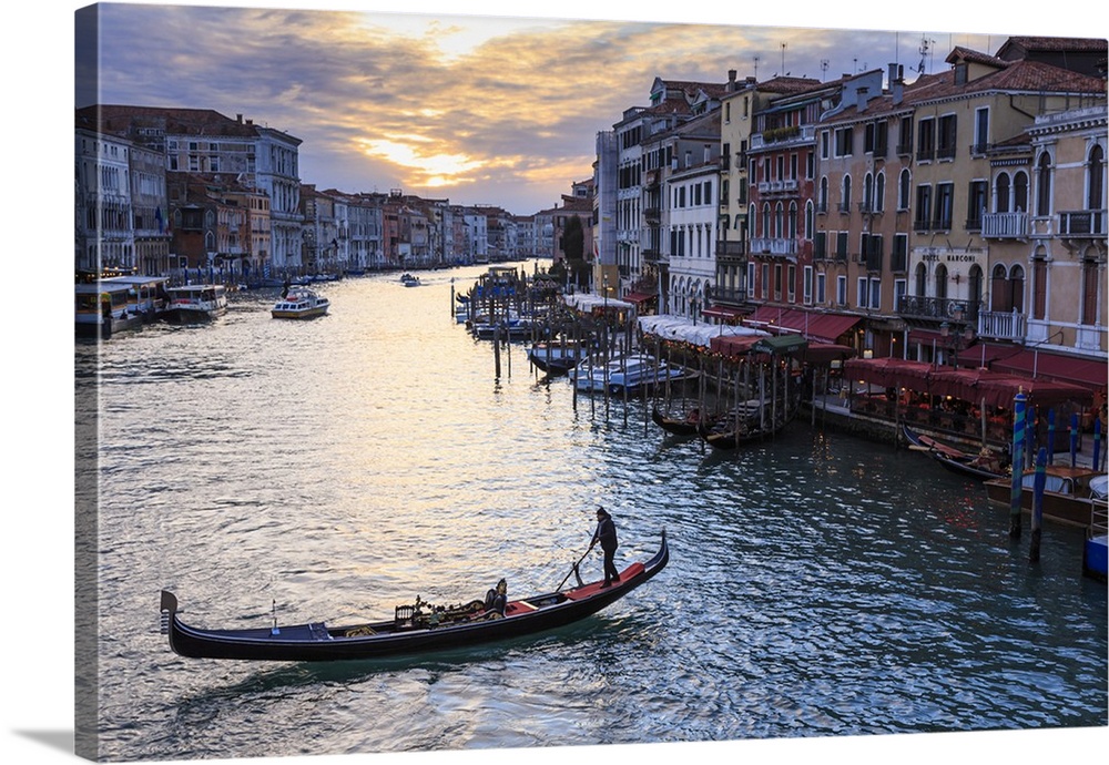 Gondola on the Grand Canal at sunset in winter, from Rialto Bridge, Venice, Veneto, Italy