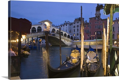Gondolas moored on the Grand Canal at Riva del Vin, Venice, Italy