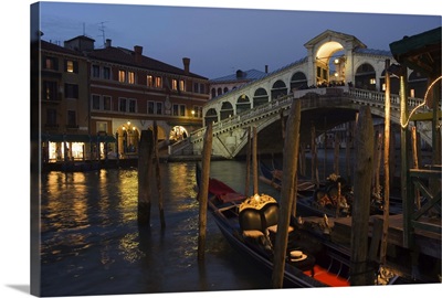 Grand Canal, Rialto Bridge at night, gondolas on waterfront, Venice, Veneto, Italy