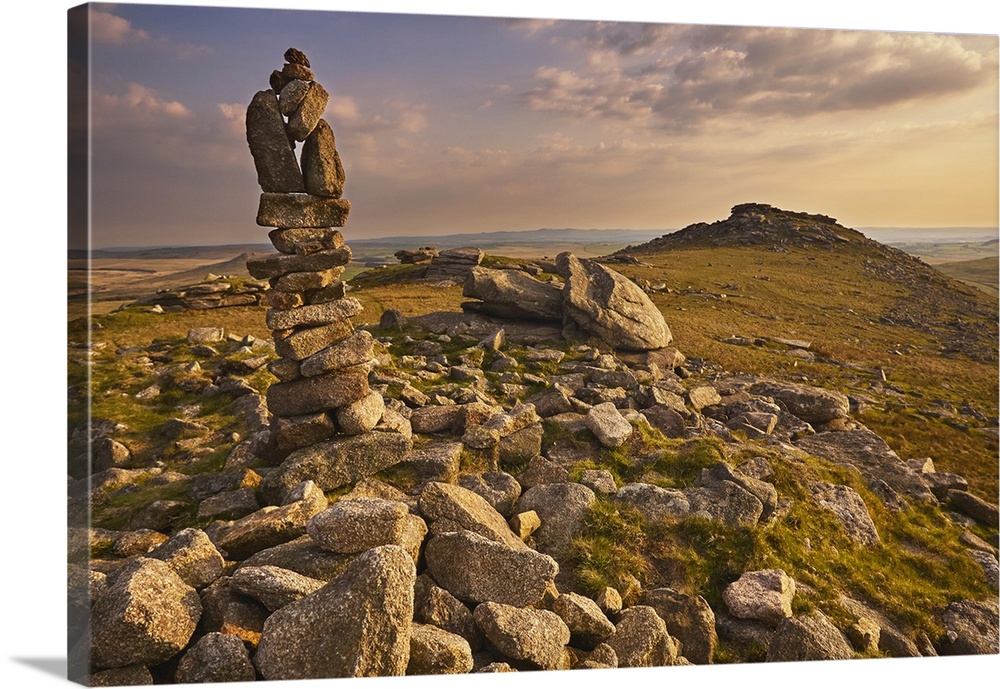 Granite boulders on the summit of Rough Tor, one of the highest points of Bodmin Moor, lit by evening sunlight, north Corn...