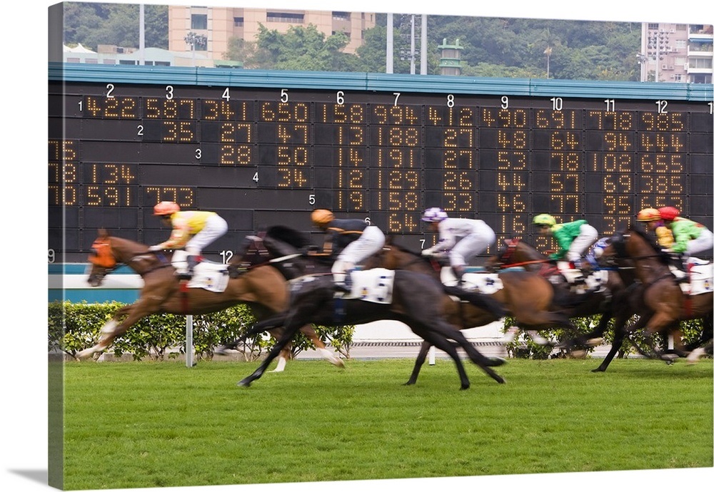 Horses race past large scoreboard during race at Happy Valley racecourse, Hong Kong Wall Art ...