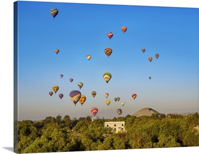 Hot Air Balloons Flying Over The Pyramid Of The Sun At Sunrise, Teotihuacan, Mexico