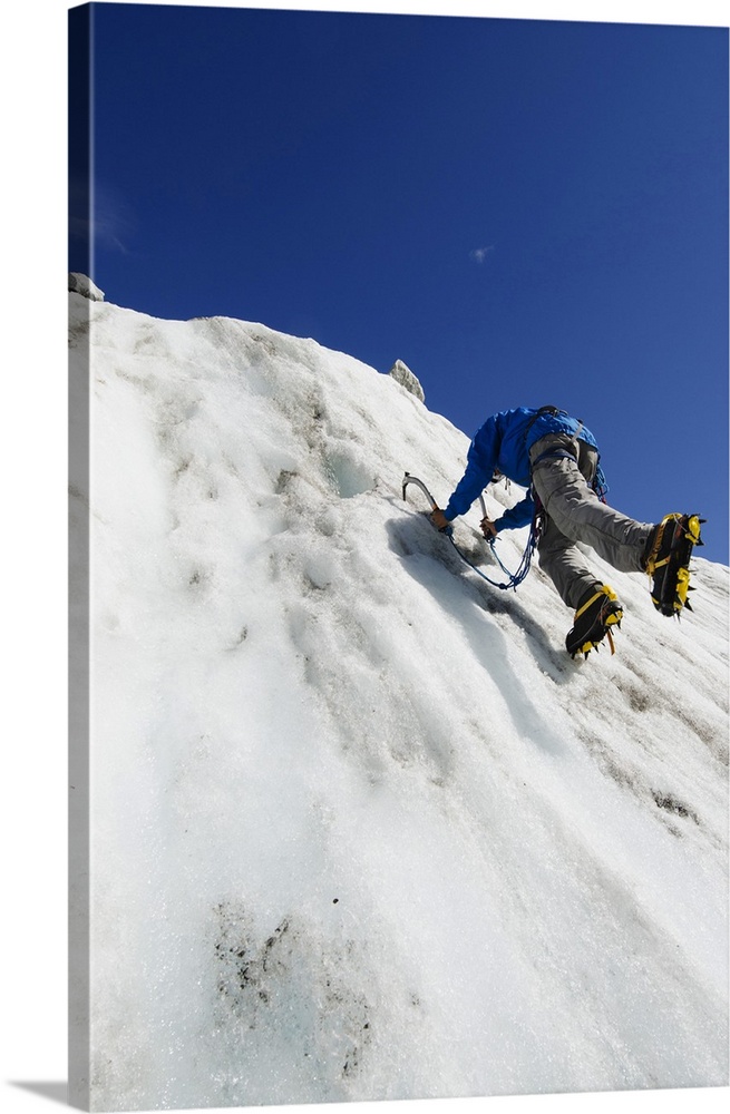Ice climber at Mer de Glace glacier, Chamonix, Haute-Savoie, French Alps, France, Europe