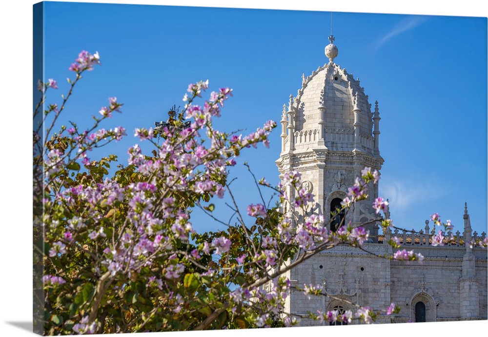 View of JerAlnimos Monastery (Monastery of the Hieronymites) and spring blossom in Empire Square Garden on a sunny day, Li...