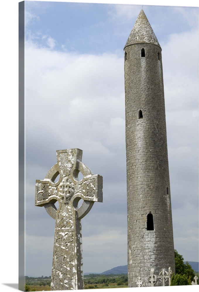 Kilmacdaugh Round Tower and Celtic style cross, Connacht, Republic of Ireland