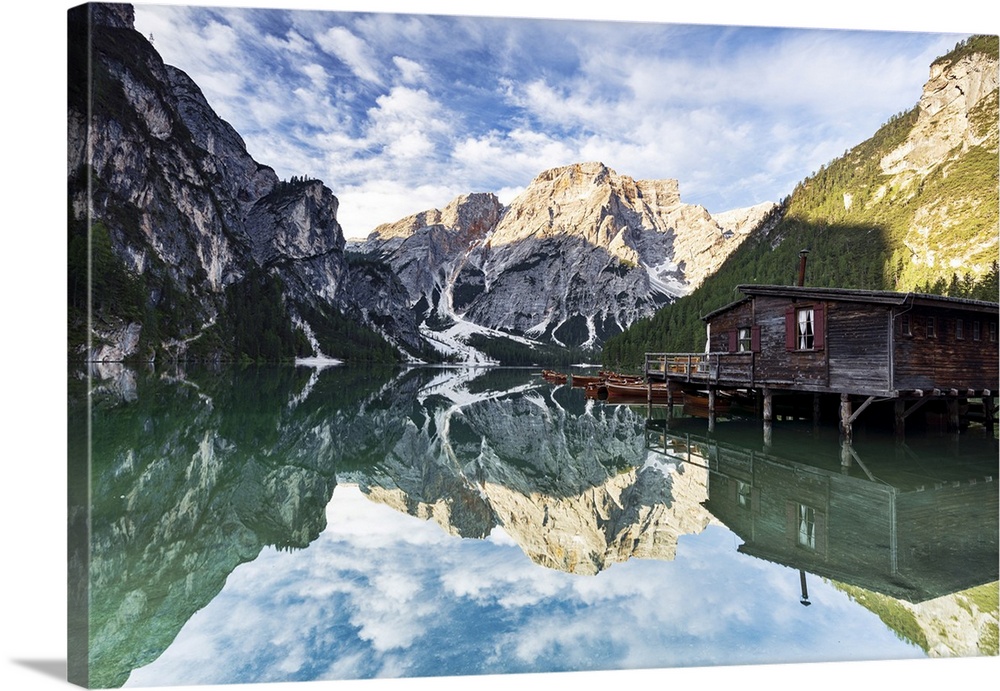 Lake Braies (Pragser Wildsee) at sunrise with Croda del Becco mountain reflected in water, Dolomites, South Tyrol, Italy, ...