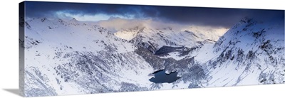Lake Cavloc And Snowy Woods, Bregaglia Valley, Canton Of Graubunden, Switzerland