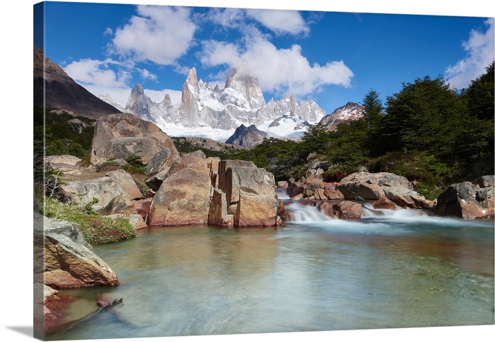 Wide angle long exposure landscape featuring Monte Fitz Roy in the background and clear water river in the foreground, Pat...