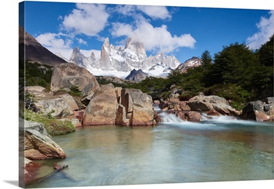 Landscape featuring Monte Fitz Roy in the background and clear water river in front