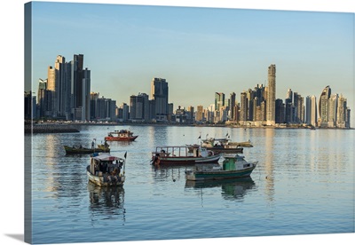 Little fishing boats and the skyline of Panama City, Panama