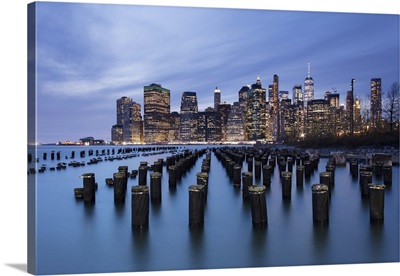 Lower Manhattan Skyline With Wooden Posts From An Old Pier, New York City