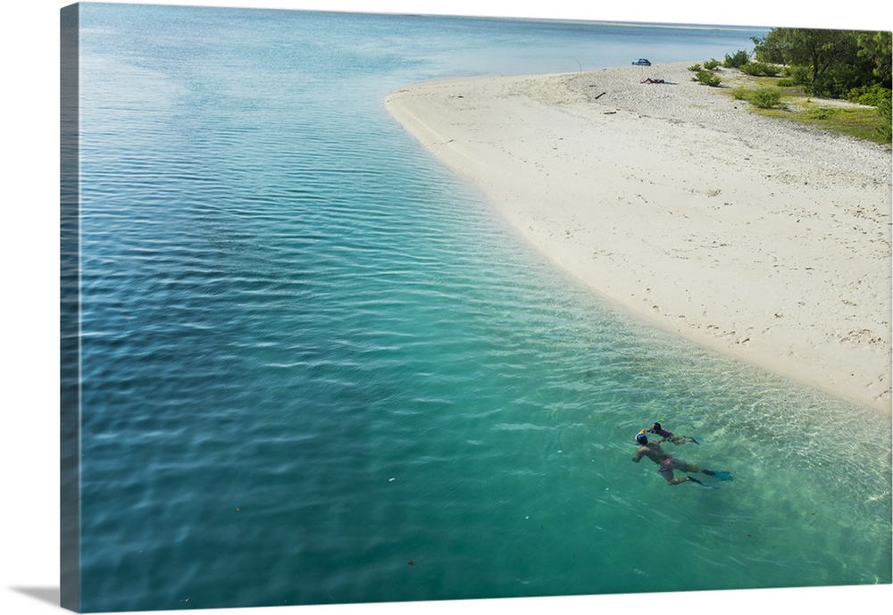 Man snorkeling in the beautiful lagoon of Ouvea, Loyalty Islands, New Caledonia